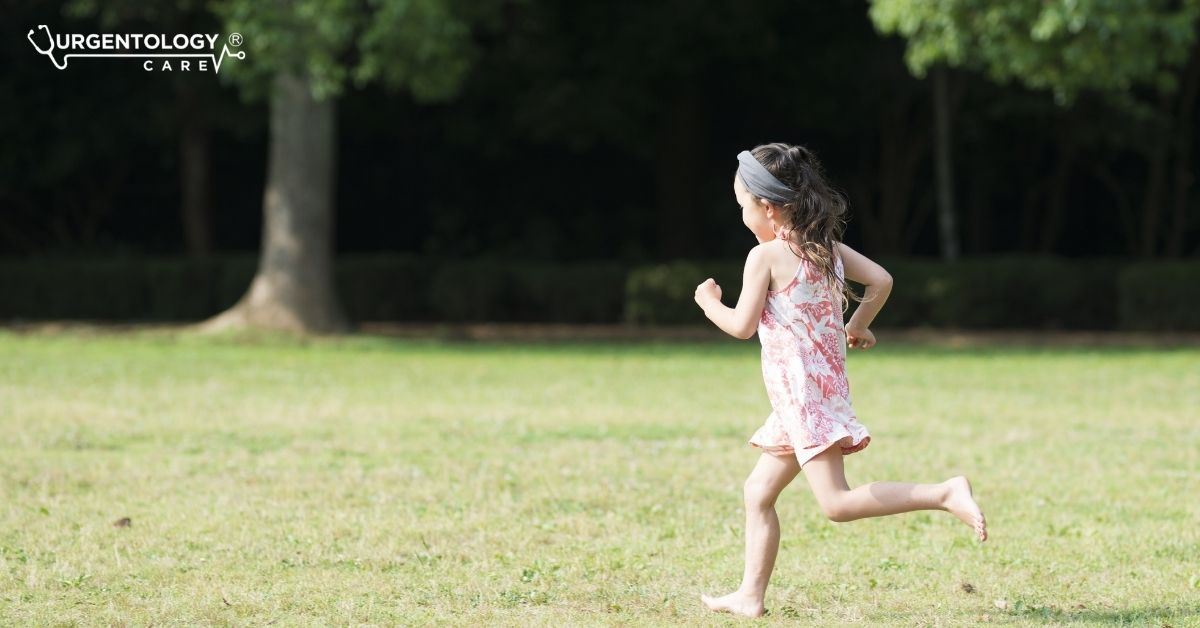 young girl running outside